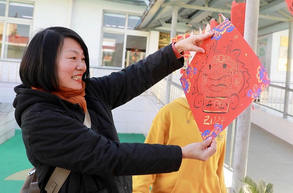 春節前夕金山這位社區志願者連續4年為居民畫生肖祝福